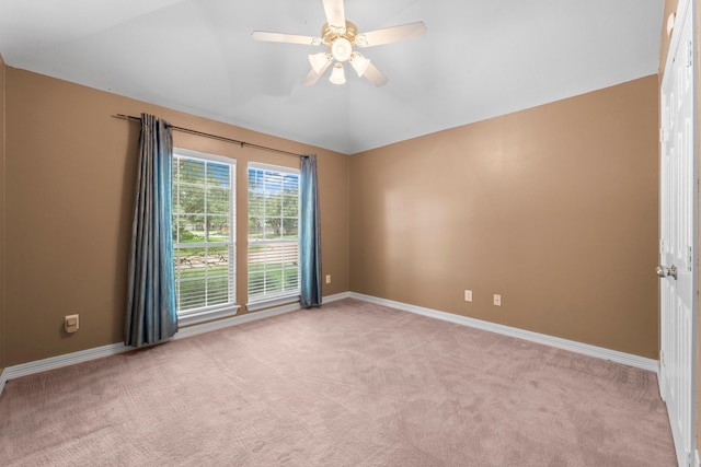 8722 Melting Shadows Ln, Houston, TX 77095 - empty room with light carpet, vaulted ceiling, and a ceiling fan