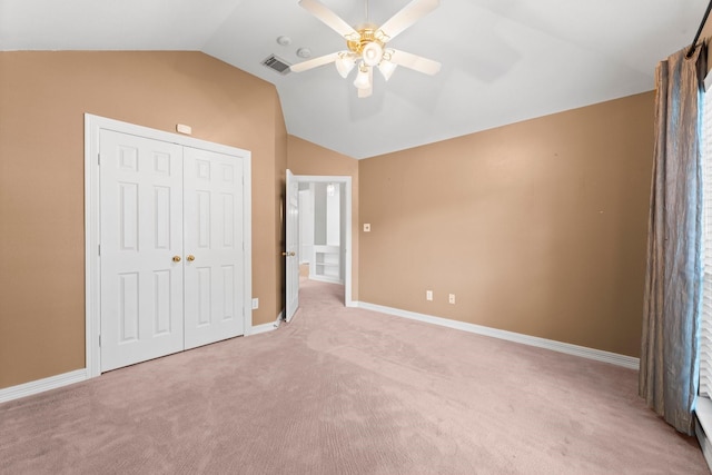 8722 Melting Shadows Ln, Houston, TX 77095 - unfurnished bedroom featuring lofted ceiling, light colored carpet, a closet, and ceiling fan