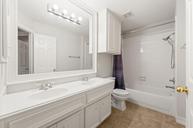 8722 Melting Shadows Ln, Houston, TX 77095 - full bathroom featuring double vanity, shower / bath combo, and tile patterned floors