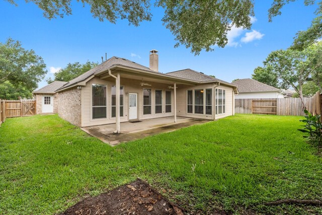 8722 Melting Shadows Ln, Houston, TX 77095 - back of house with a chimney, ceiling fan, a fenced backyard, and a patio area