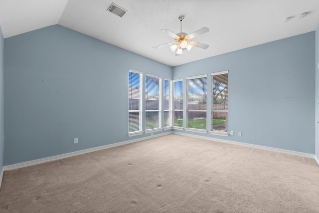 8722 Melting Shadows Ln, Houston, TX 77095 - spare room featuring a ceiling fan, carpet floors, and vaulted ceiling