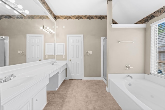 8722 Melting Shadows Ln, Houston, TX 77095 - bathroom featuring double vanity, a bath, tile patterned flooring, and a stall shower