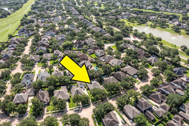 8722 Melting Shadows Ln, Houston, TX 77095 - aerial perspective of suburban area featuring a large body of water