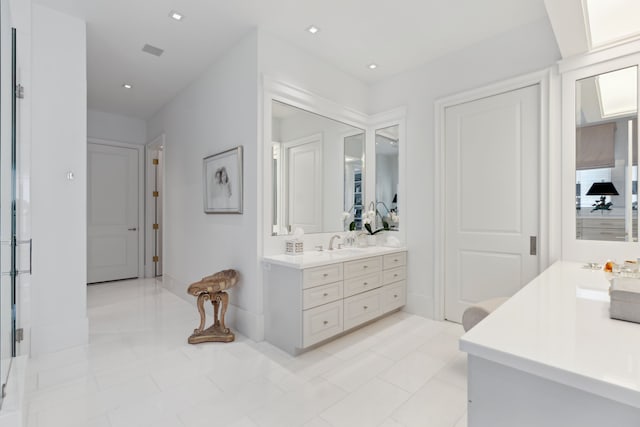 2707 Westgrove Ln, Houston, TX 77027 - full bath with two vanities and tile patterned flooring
