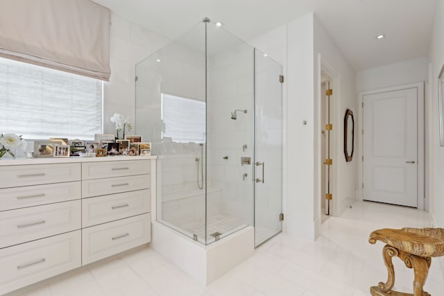 2707 Westgrove Ln, Houston, TX 77027 - bathroom with a shower stall, tile patterned floors, and vanity