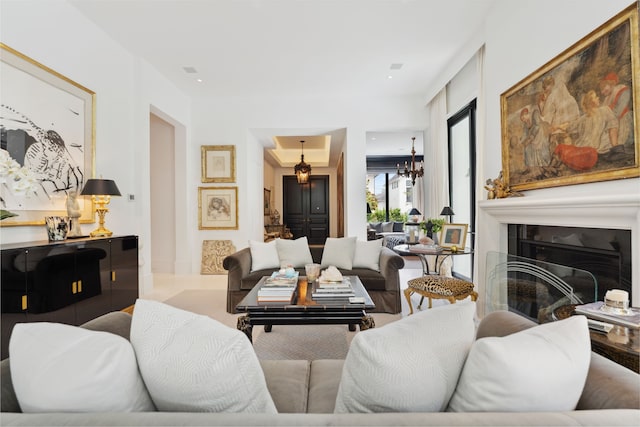 2707 Westgrove Ln, Houston, TX 77027 - living room featuring a chandelier and a glass covered fireplace