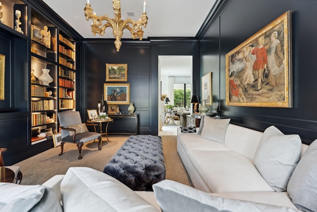 2707 Westgrove Ln, Houston, TX 77027 - living area with ornamental molding, a chandelier, a decorative wall, and built in shelves