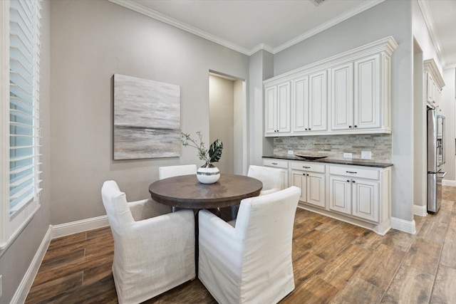 27722 Lakeway Trail Ln, Fulshear, TX 77441 - dining space with wood finished floors and ornamental molding