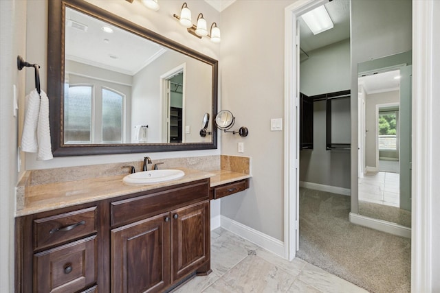 27722 Lakeway Trail Ln, Fulshear, TX 77441 - bathroom featuring ornamental molding and vanity