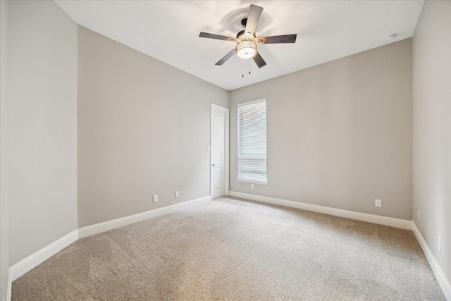 27722 Lakeway Trail Ln, Fulshear, TX 77441 - spare room featuring light carpet, a ceiling fan, and a smoke detector