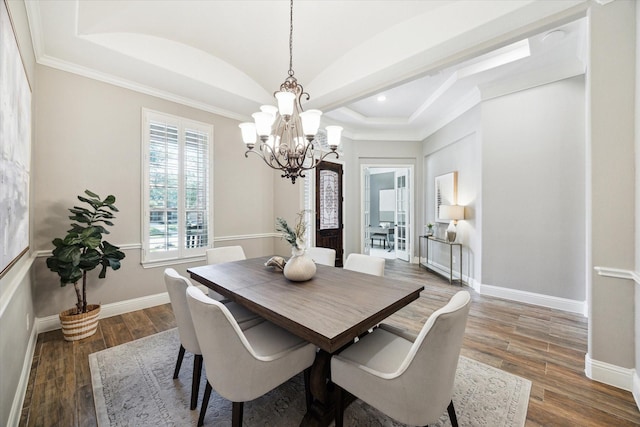 27722 Lakeway Trail Ln, Fulshear, TX 77441 - dining room with a chandelier, wood finished floors, recessed lighting, crown molding, and lofted ceiling