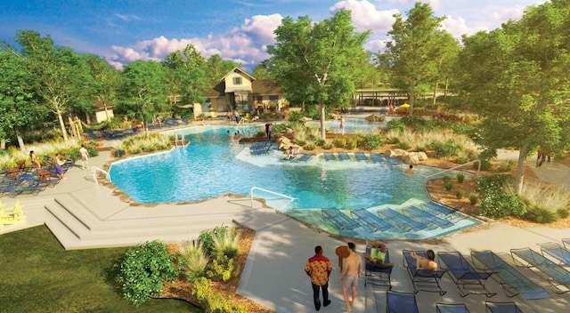 10922 Palmwood Dr, Missouri City, TX 77459 - community pool featuring a patio area and view of scattered trees