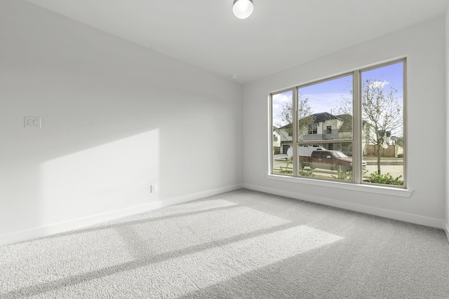 10922 Palmwood Dr, Missouri City, TX 77459 - carpeted spare room with baseboards and vaulted ceiling