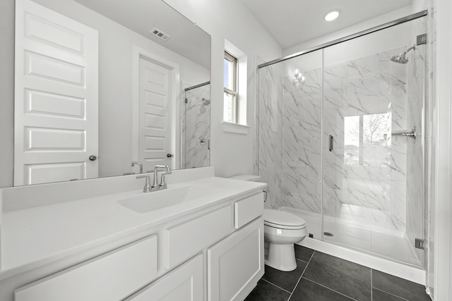 10922 Palmwood Dr, Missouri City, TX 77459 - bathroom with vanity, a marble finish shower, and tile patterned floors