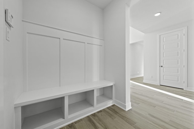 10922 Palmwood Dr, Missouri City, TX 77459 - mudroom with wood finished floors and baseboards