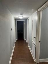 12500 Sandpiper Dr Unit 57, Houston, TX 77035 - hallway with baseboards