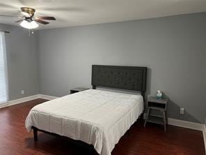 12500 Sandpiper Dr Unit 57, Houston, TX 77035 - bedroom with wood finished floors and ceiling fan
