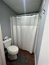 12500 Sandpiper Dr Unit 57, Houston, TX 77035 - full bathroom featuring a shower with curtain and tile patterned floors