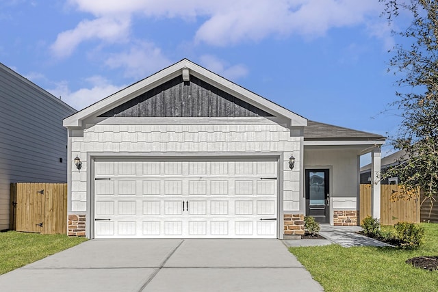 8206 Blooming Meadows Dr, Houston, TX 77016 - ranch-style house with an attached garage, concrete driveway, and stone siding