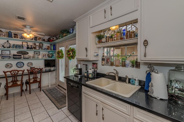 5975 Meadow Way, Beaumont, TX 77707 - kitchen featuring dishwasher, ceiling fan, white cabinets, light tile patterned flooring, and dark countertops