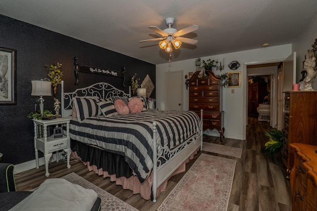 5975 Meadow Way, Beaumont, TX 77707 - bedroom featuring wood finished floors and a ceiling fan