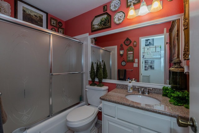 5975 Meadow Way, Beaumont, TX 77707 - bathroom featuring vanity and bath / shower combo with glass door