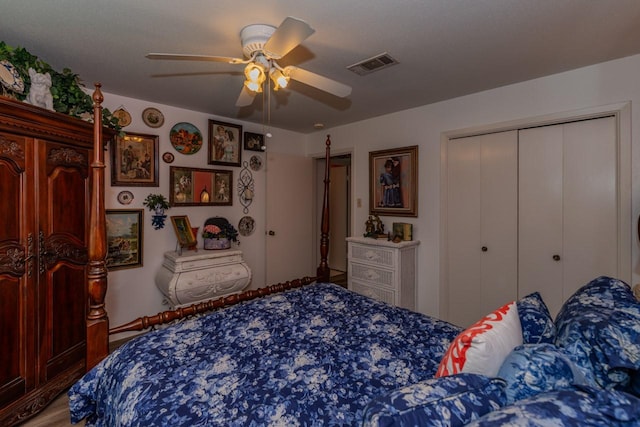 5975 Meadow Way, Beaumont, TX 77707 - bedroom with a closet, a ceiling fan, and wood finished floors