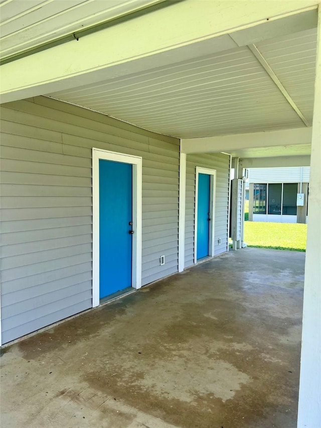 3185 Sea Castle Dr, Crystal Beach, TX 77650 - view of patio featuring an attached carport