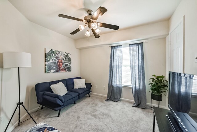 6103 Yorkglen Manor Ln, Houston, TX 77084 - living room featuring a ceiling fan and light carpet