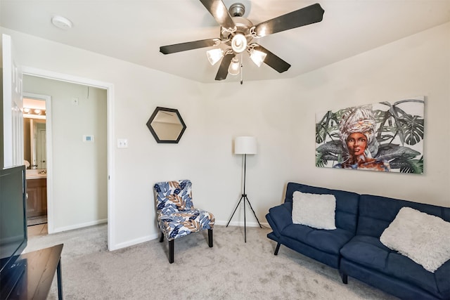 6103 Yorkglen Manor Ln, Houston, TX 77084 - carpeted living room featuring ceiling fan and baseboards