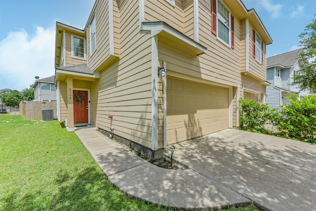 6103 Yorkglen Manor Ln, Houston, TX 77084 - view of home's exterior with an attached garage and driveway