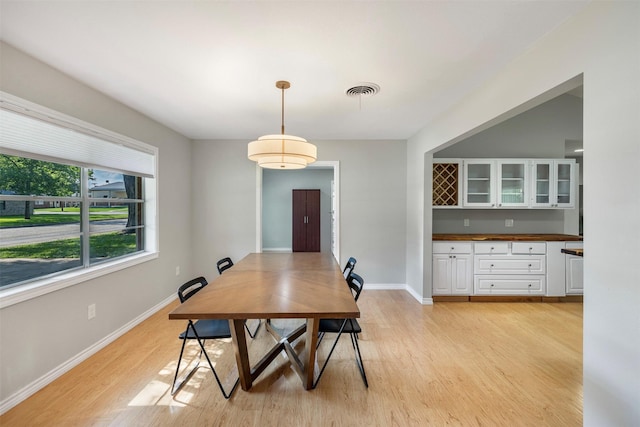 420 Hale St, Lexington, TX 78947 - dining room with light wood-style floors and baseboards