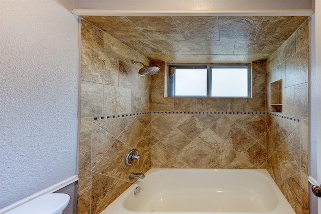 6803 Fawncliff Dr, Houston, TX 77069 - full bathroom featuring washtub / shower combination and a textured wall
