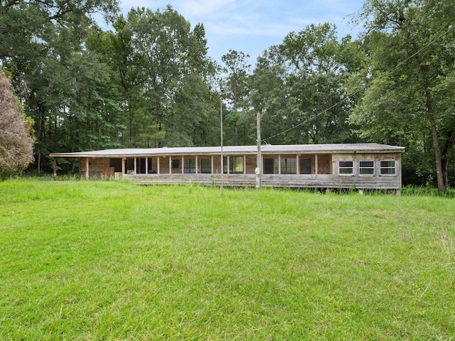 19995 Fm 92 S, Fred, TX 77616 - view of front of house with a metal roof