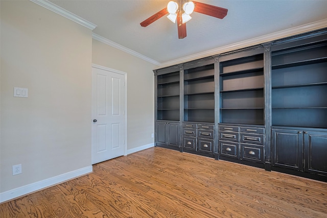 9 Foxworth Ct, Sugar Land, TX 77479 - spare room with crown molding, ceiling fan, and wood finished floors