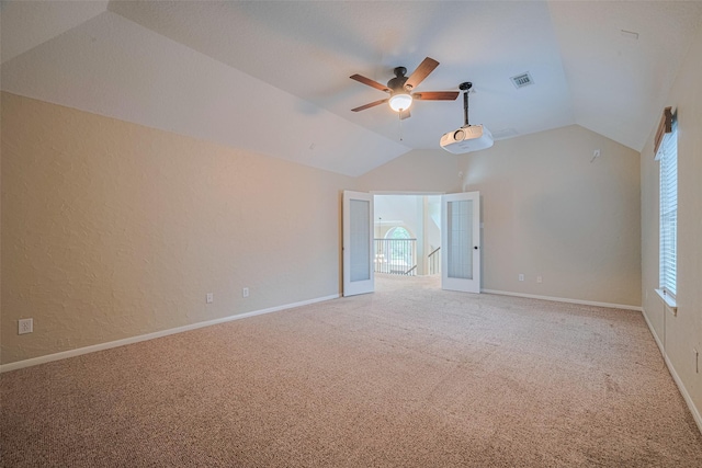 9 Foxworth Ct, Sugar Land, TX 77479 - spare room featuring lofted ceiling, a ceiling fan, light colored carpet, and a textured wall