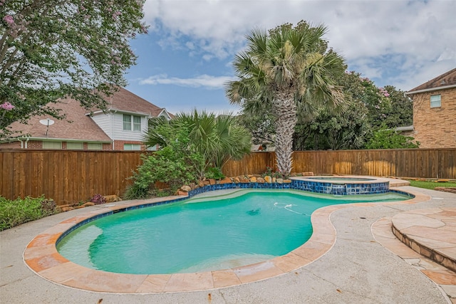 9 Foxworth Ct, Sugar Land, TX 77479 - view of swimming pool with a fenced backyard and a pool with connected hot tub