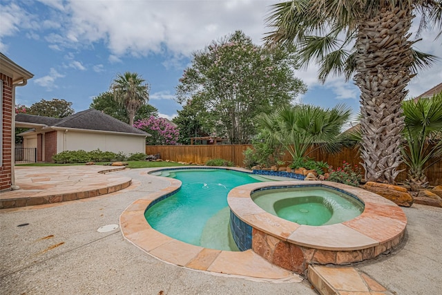 9 Foxworth Ct, Sugar Land, TX 77479 - view of swimming pool featuring a fenced backyard, a patio area, and a pool with connected hot tub