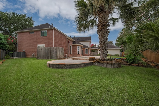 9 Foxworth Ct, Sugar Land, TX 77479 - back of house featuring a patio area, brick siding, and a fenced backyard