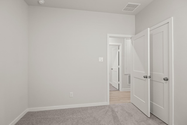 7826 Ruthie Ravine Ct, Spring, TX 77379 - unfurnished bedroom featuring light carpet