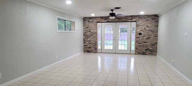 413 S Temple Dr, Diboll, TX 75941 - empty room featuring ceiling fan, crown molding, french doors, light tile patterned floors, and recessed lighting