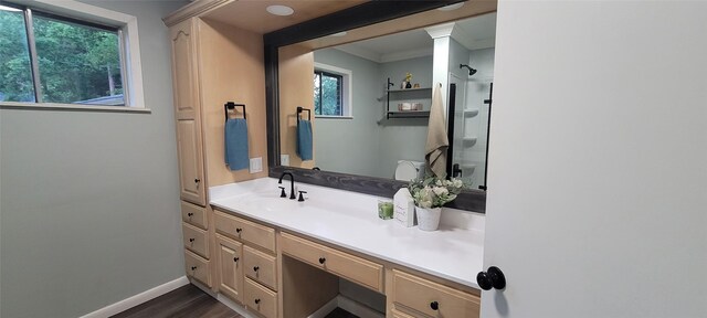 413 S Temple Dr, Diboll, TX 75941 - full bath with vanity, crown molding, wood finished floors, and a shower