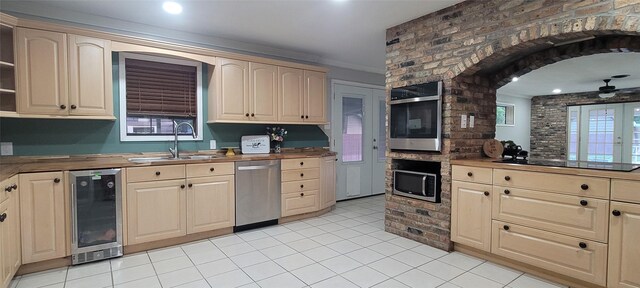 413 S Temple Dr, Diboll, TX 75941 - kitchen featuring appliances with stainless steel finishes, wine cooler, butcher block counters, open shelves, and light tile patterned floors
