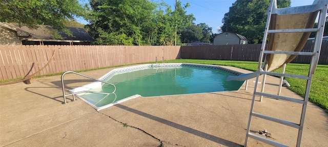 413 S Temple Dr, Diboll, TX 75941 - view of pool featuring a water slide, a patio, and a fenced backyard