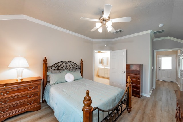 5242 Garnetfield Ln, Katy, TX 77494 - bedroom with light wood-style flooring, ceiling fan, vaulted ceiling, ornamental molding, and a textured ceiling