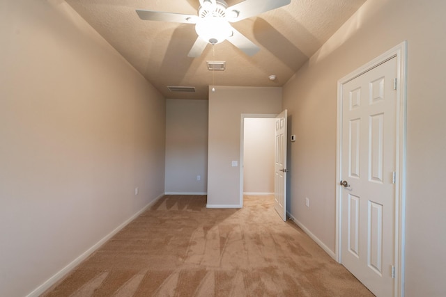 5242 Garnetfield Ln, Katy, TX 77494 - unfurnished bedroom with light colored carpet and a ceiling fan