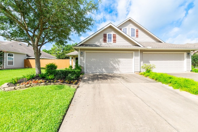 5242 Garnetfield Ln, Katy, TX 77494 - traditional home with concrete driveway and a garage