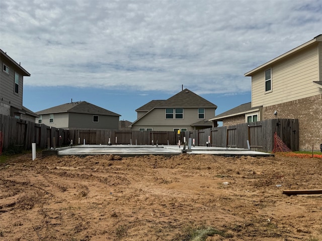 7831 Ruth Ravine Ct, Spring, TX 77379 - rear view of house with a patio, a fenced backyard, and a residential view