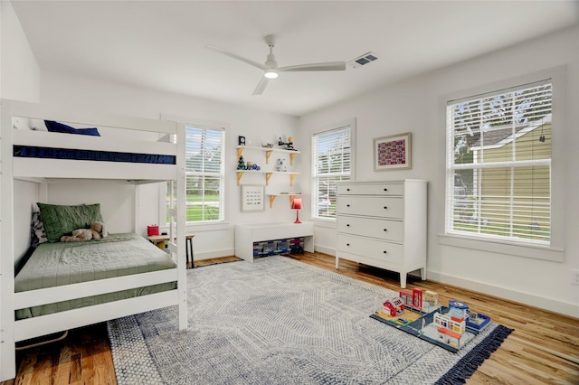 1039 Lamonte Ln, Houston, TX 77018 - bedroom with wood finished floors and a ceiling fan