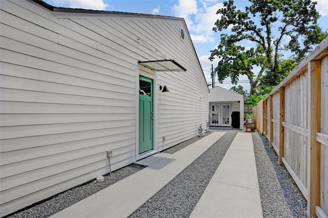 1039 Lamonte Ln, Houston, TX 77018 - view of side of property with french doors and a fenced backyard